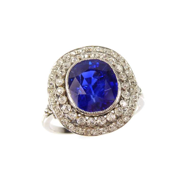 Cushion cut sapphire and diamond cluster ring